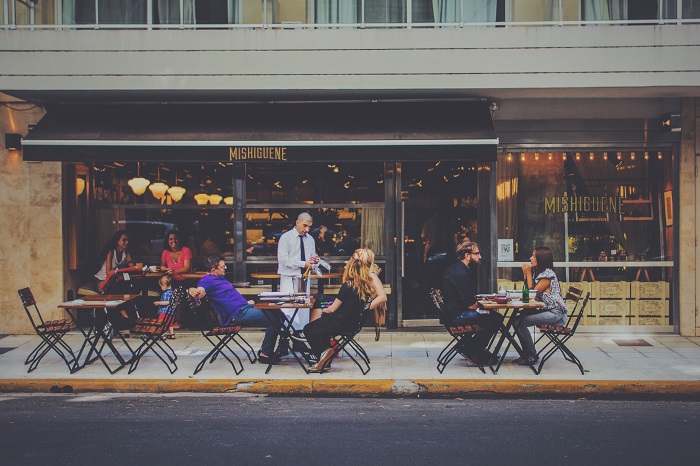 people eating at an outdoor cafe