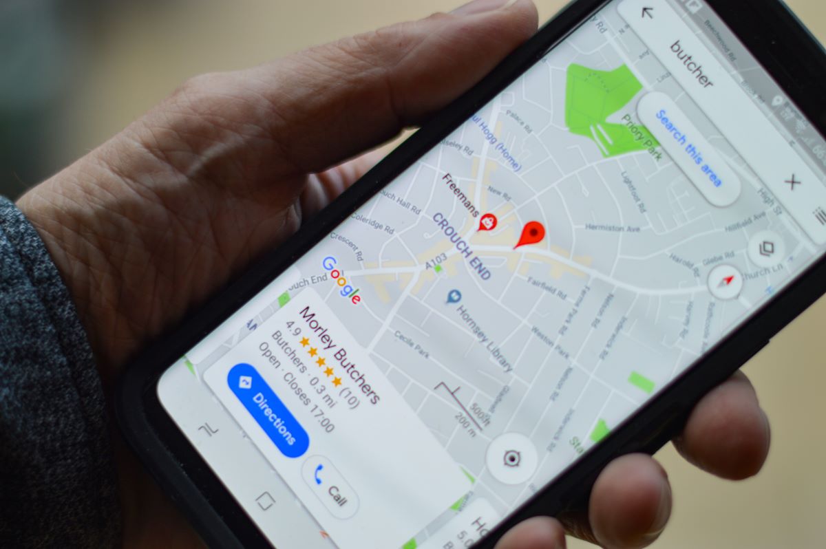 mobile phone user searching for local business with Google Maps